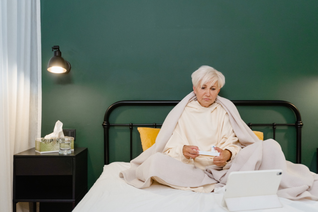 Patient in bed using remote consultation 